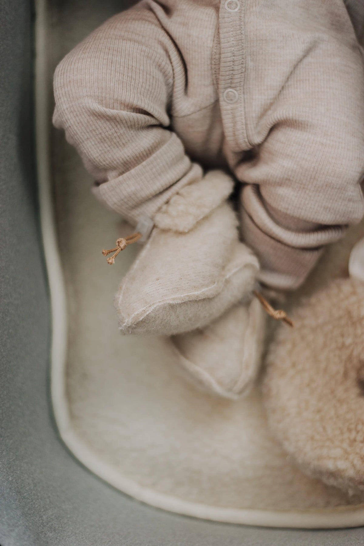Wollen onderlegger kinderwagen